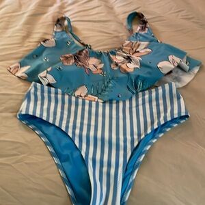 Cute blue bikini with floral ruffled top and striped bottom